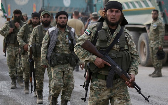 FILE - Turkish-backed Syrian opposition armed groups in northern Syria