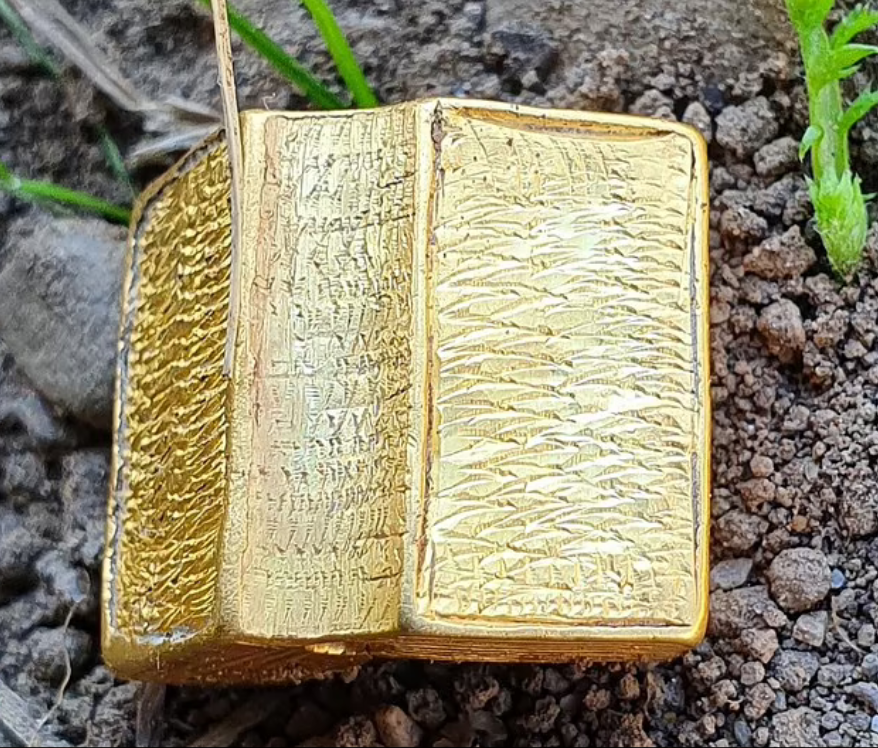 The discovered gold Bible - Daily Mail