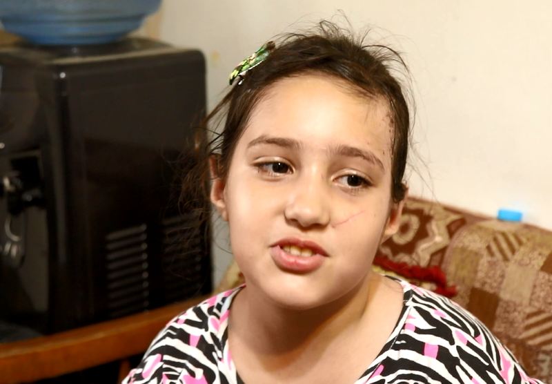 Child Lamar tells her painful story