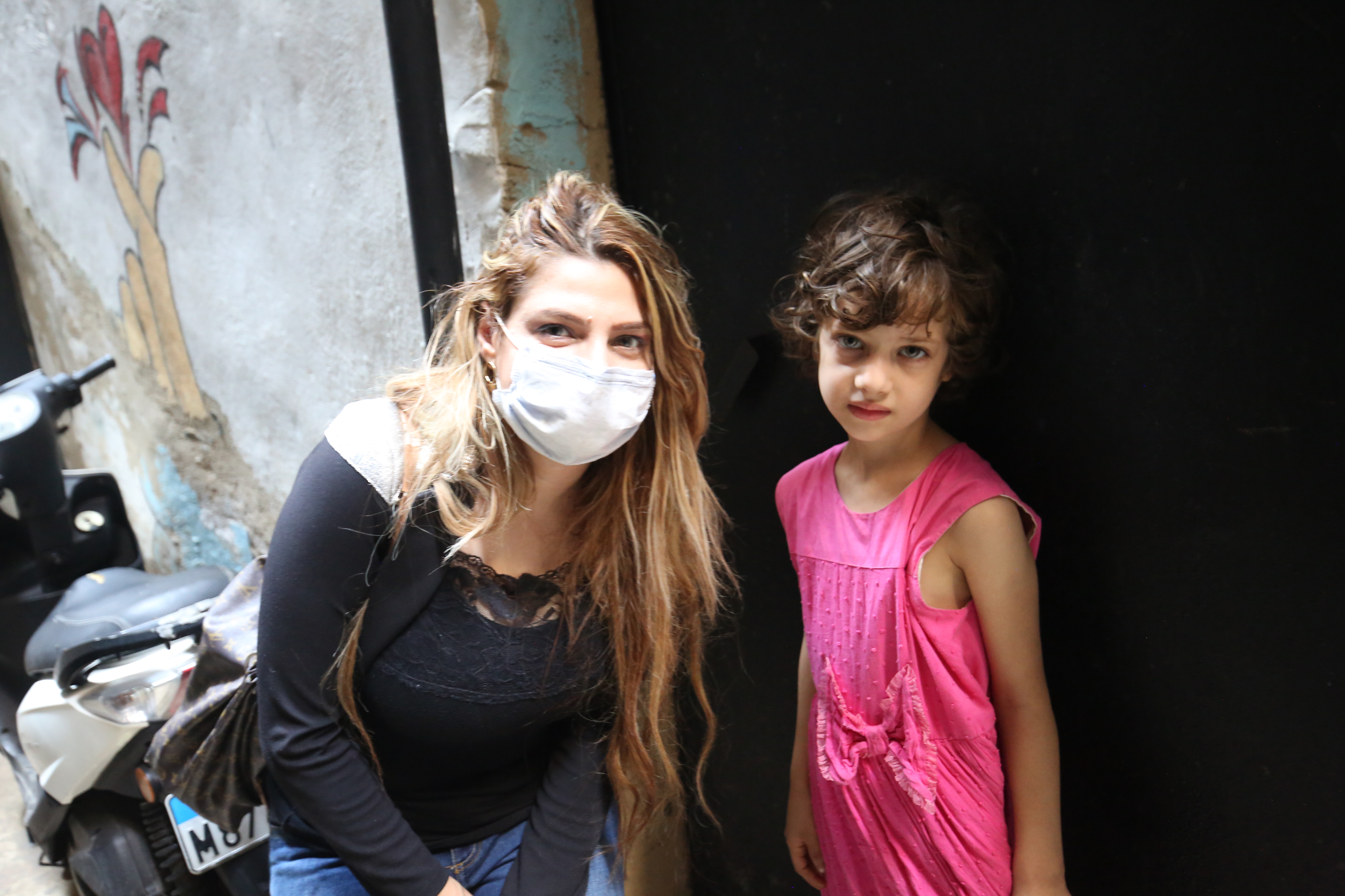 Young girl Aya with the reprter
