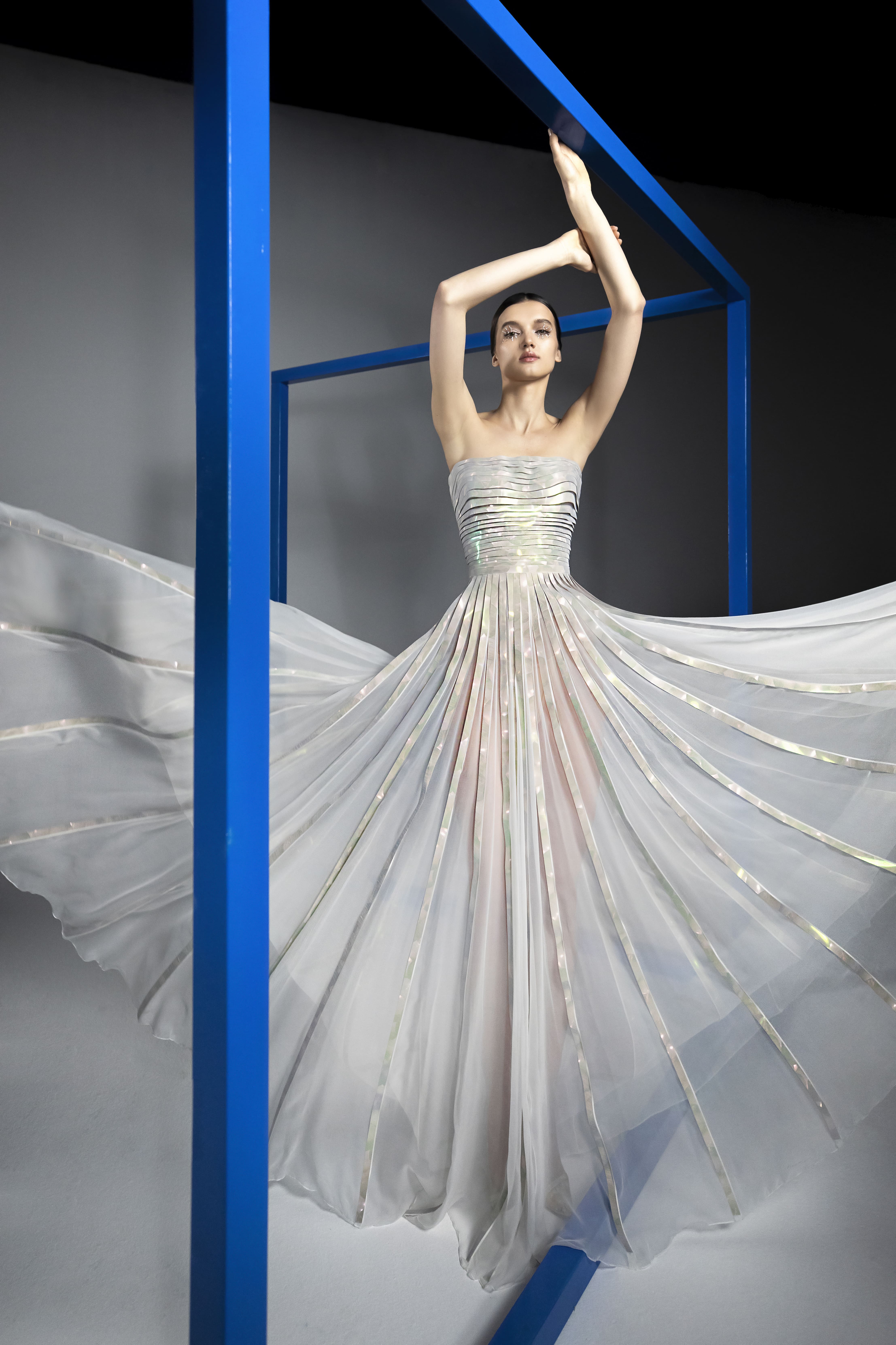 SS21-1 Ivory silk chiffon strapless gown featuring holographic embellishments of golden sequins sheetss -min