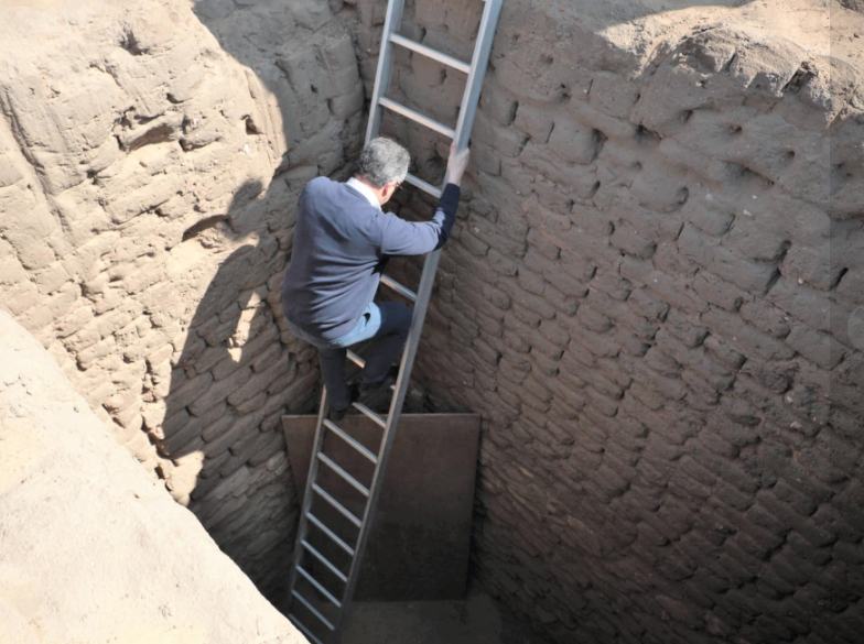 Enani entering one of the tombs - Min. of Tourism & Antiquities
