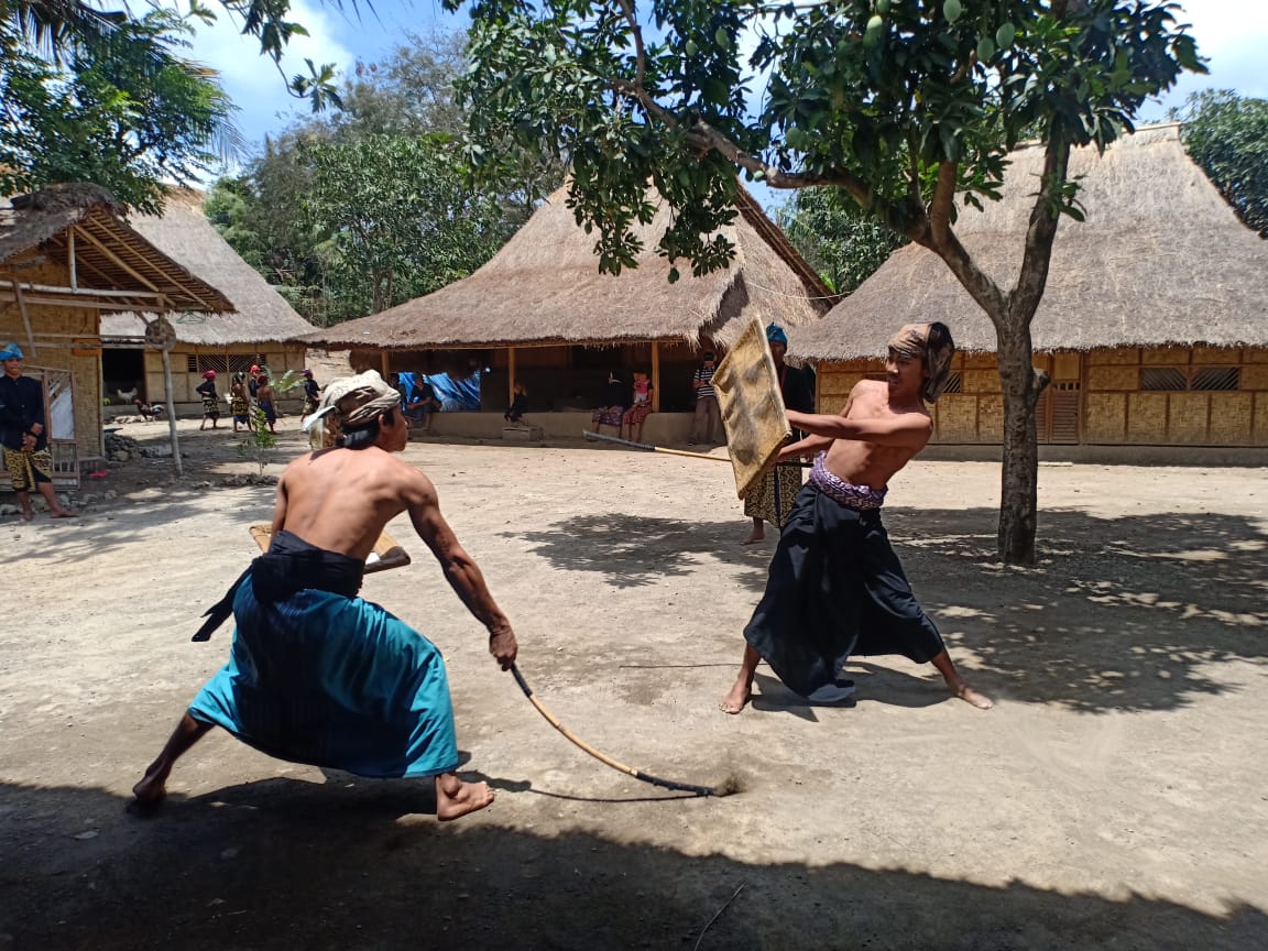 Sasak Village  - stick fighting - source Egypt Today