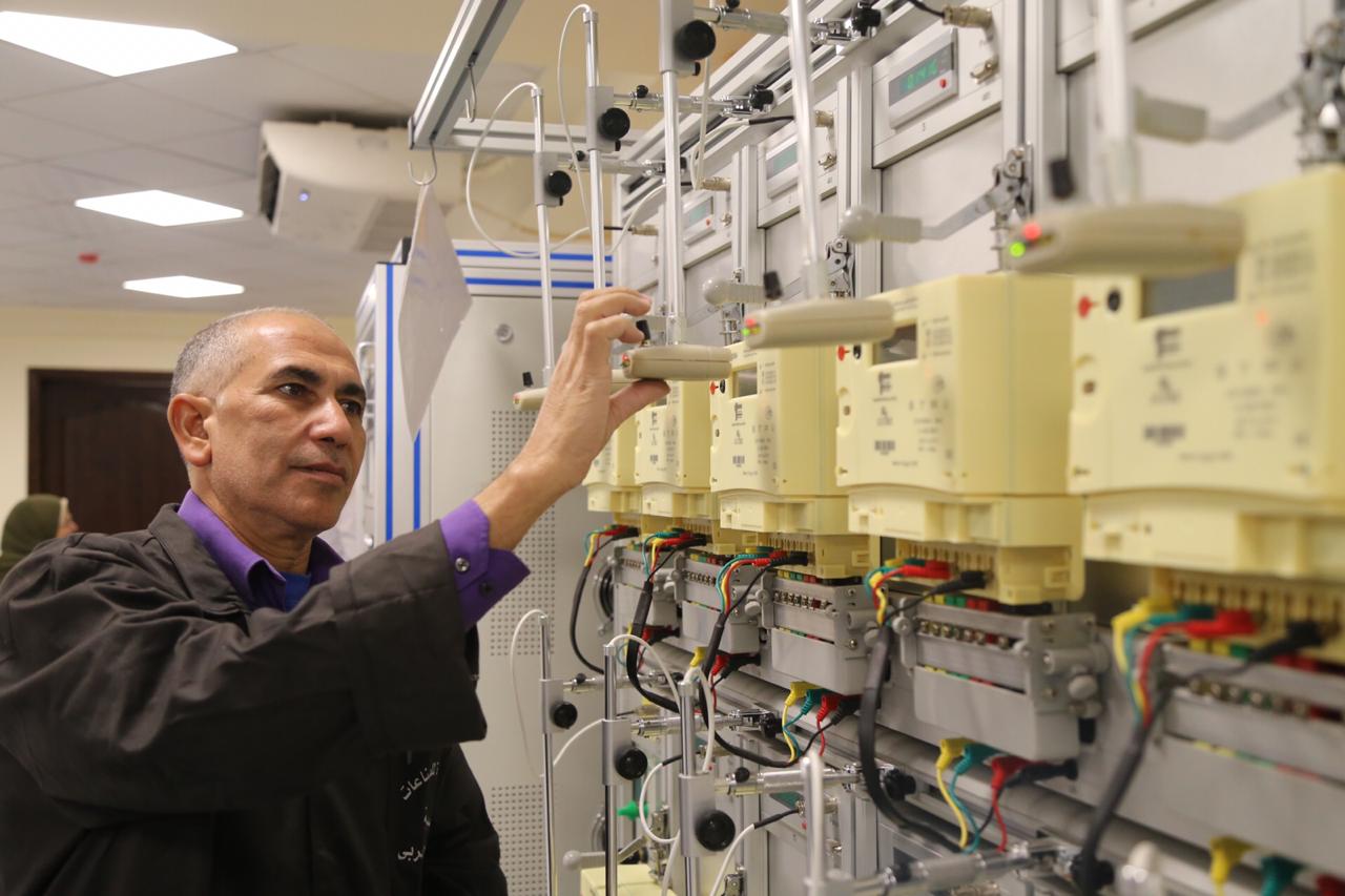 Technician checking pre-paid meters in Egypt - Mohamed el-Hosary_Egypt Today