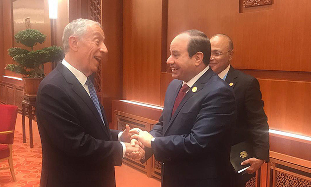 President Sisi and Portuguese counterpart Marcelo Rebelo de Sousa shake hands in Beijing- press photo