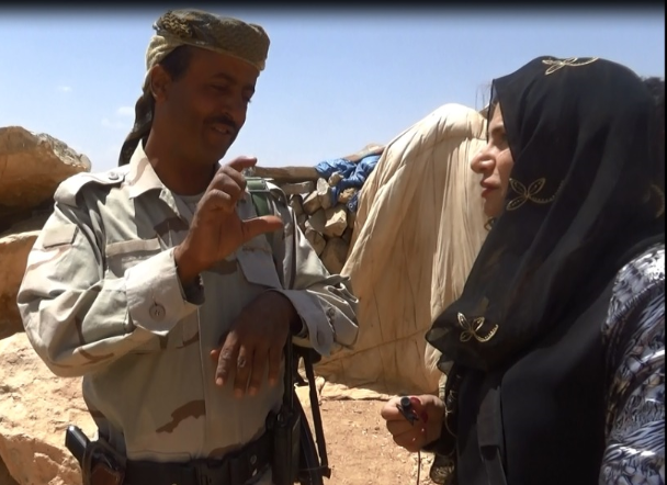 fighter is explaining the kinds of weapons that used in the war